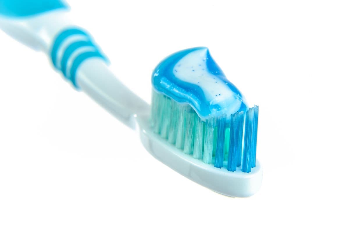 Clean toothbrushes arranged on a bright surface