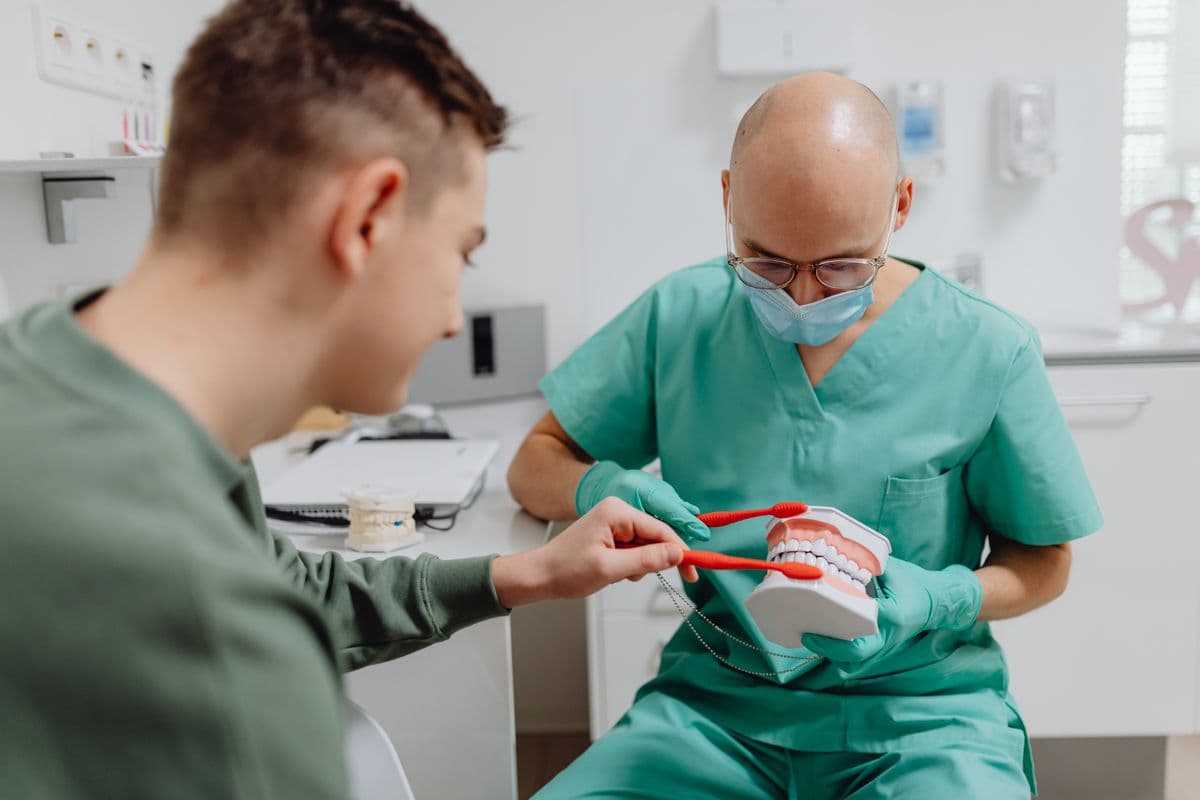 A person smiling confidently after orthodontic treatment