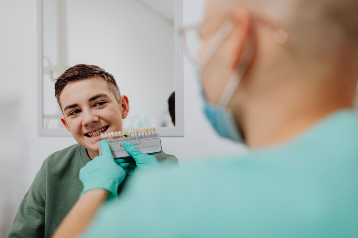 A boy smiling at a modern dental visit